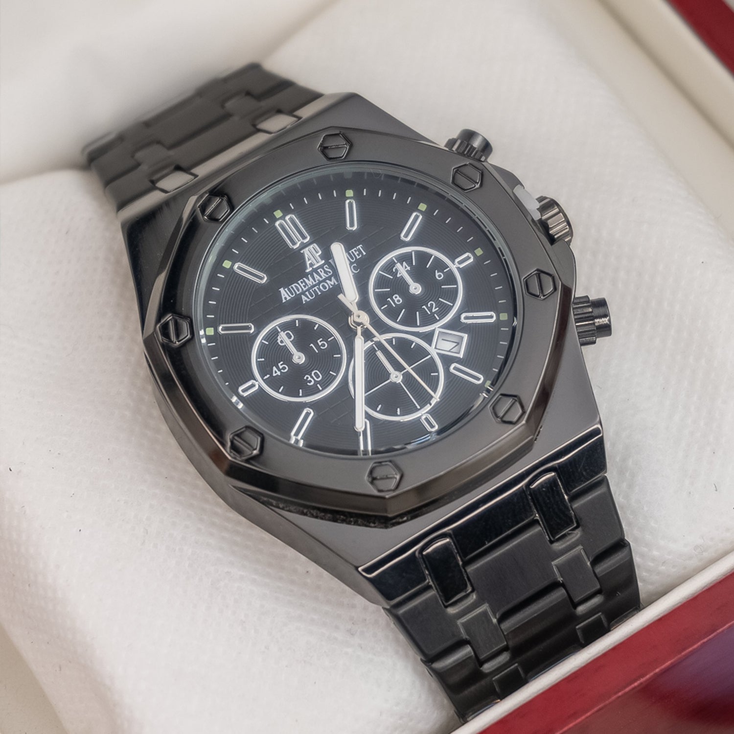 Audemars Piguet style black men’s chronograph watch with octagonal bezel, stainless steel bracelet, and multifunction dial – displayed in luxury box from Explorer’s Dial men’s collection.