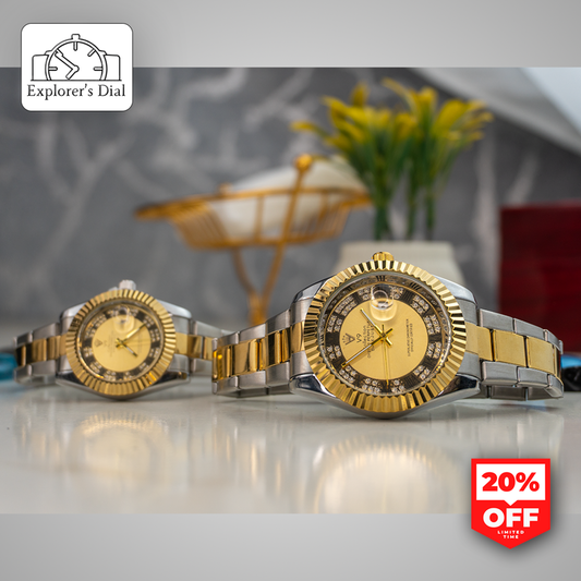 "Stylish couple watches placed on table – matching dual-tone wristwatches with crystal-studded bezels"

